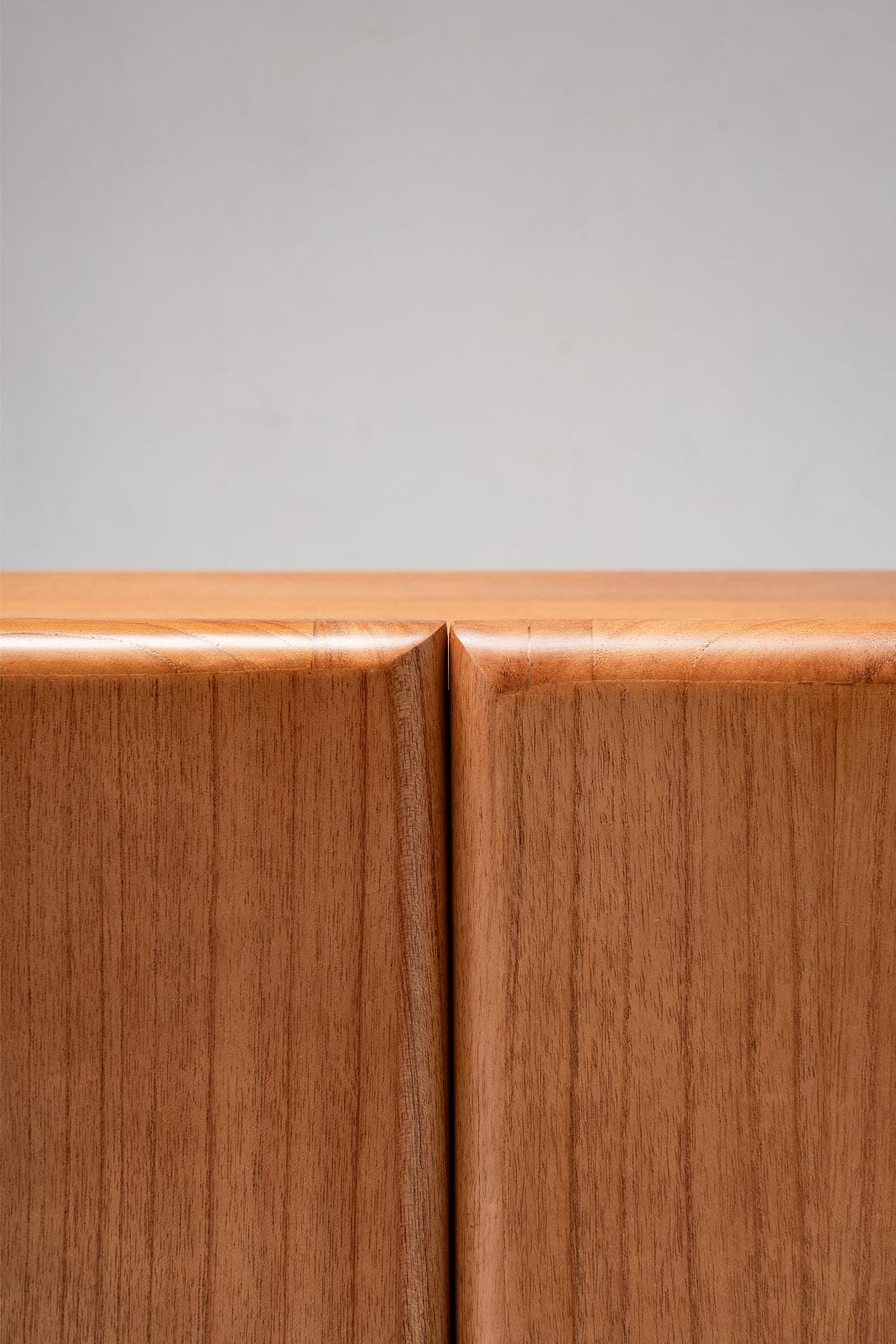 Close-up of wooden tv console doors