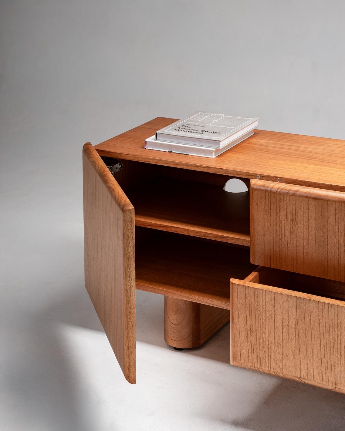 Wooden entertainment unit with open doors