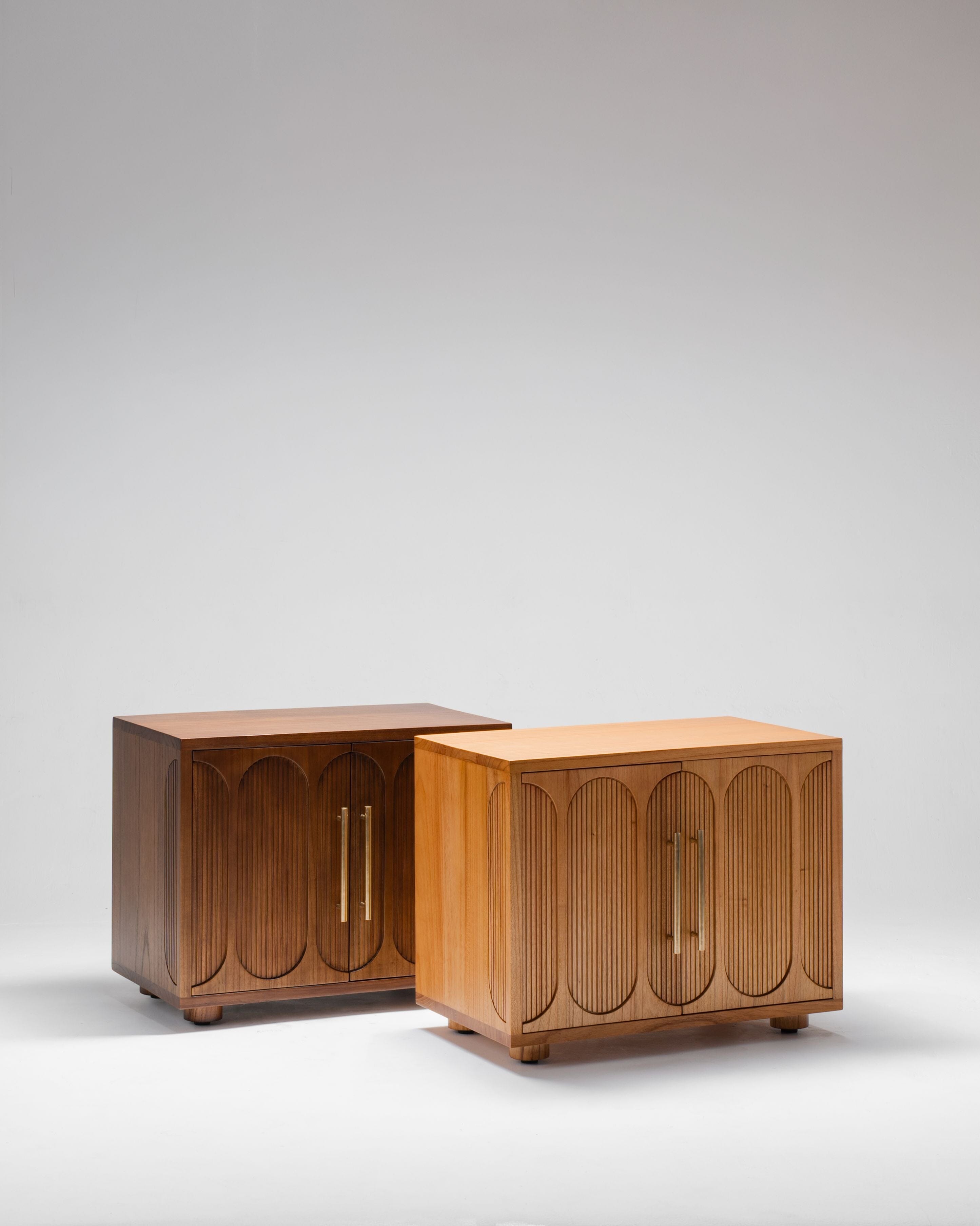 Two wooden cabinets with decorative handles