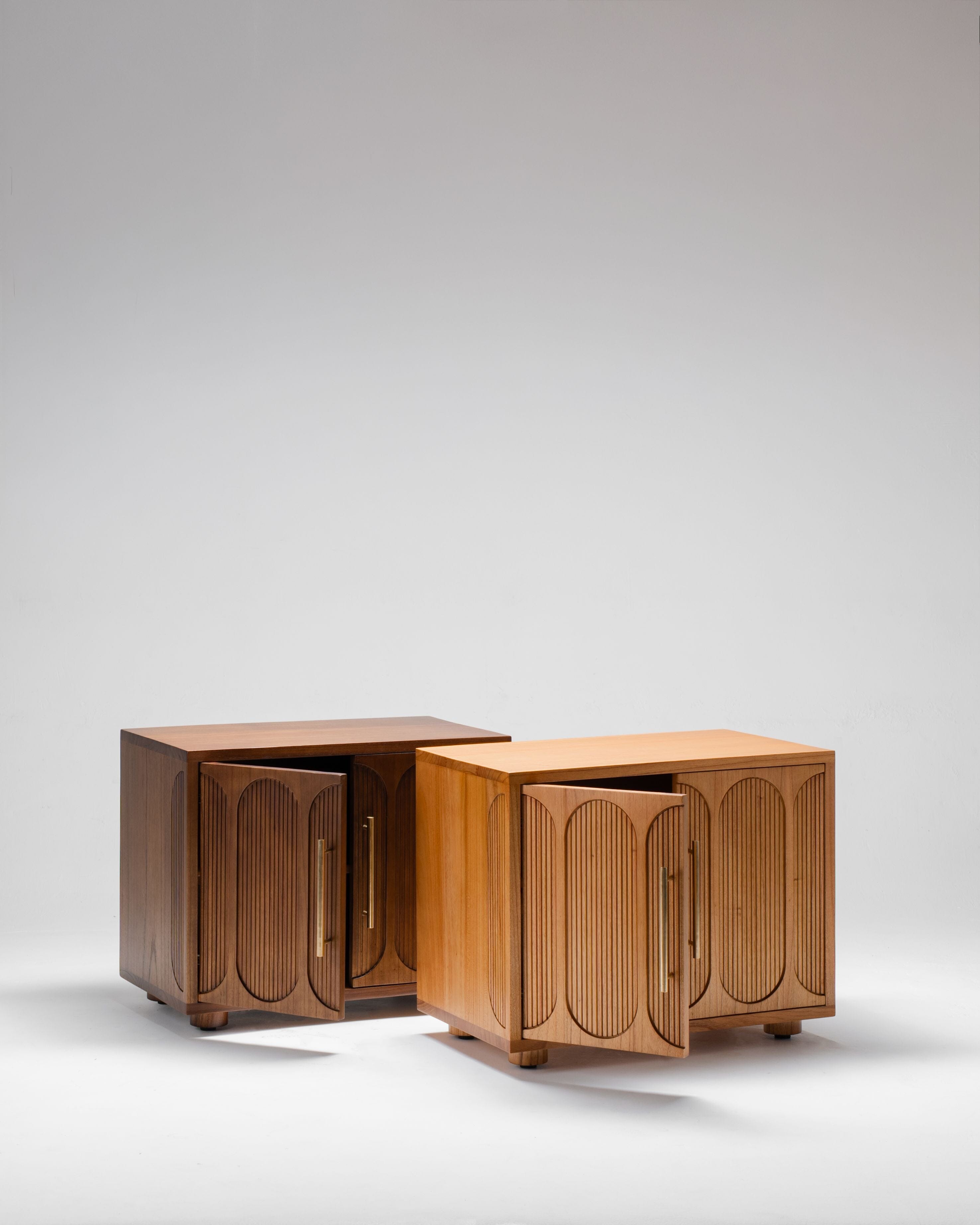 Two wooden bedside cabinets, in two colours