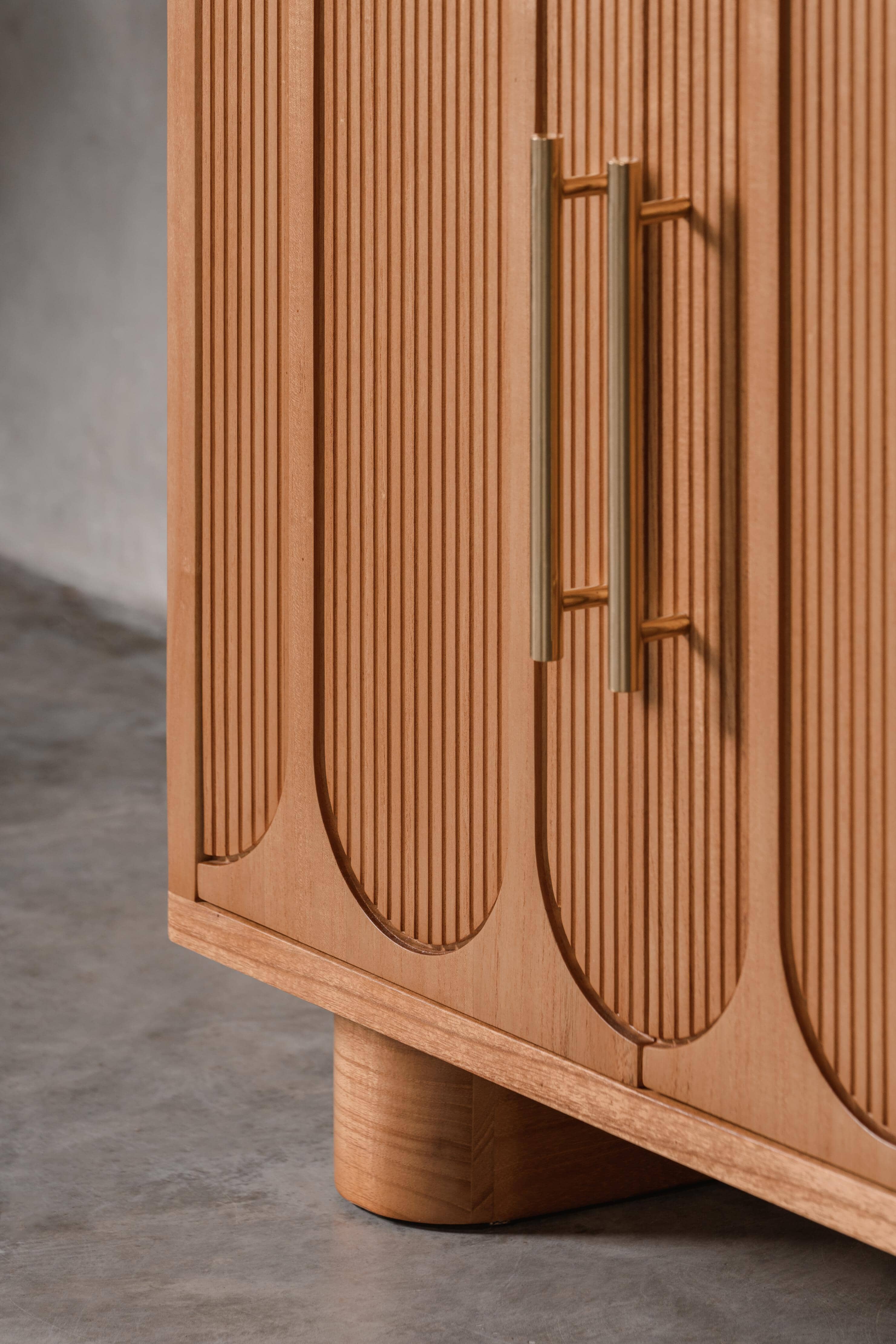 light wood detail on a storage console
