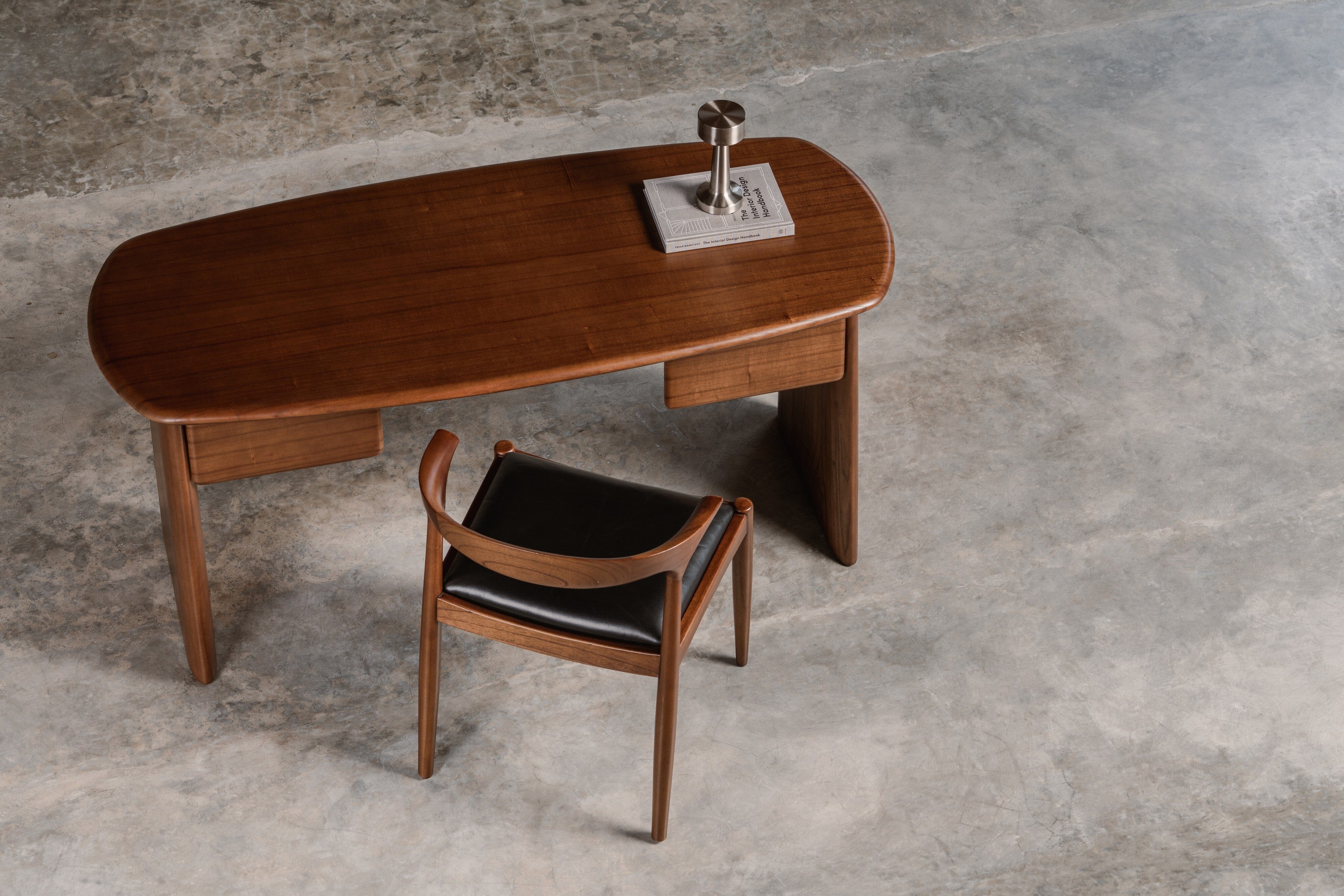 chair on wooden desk, with desk drawers