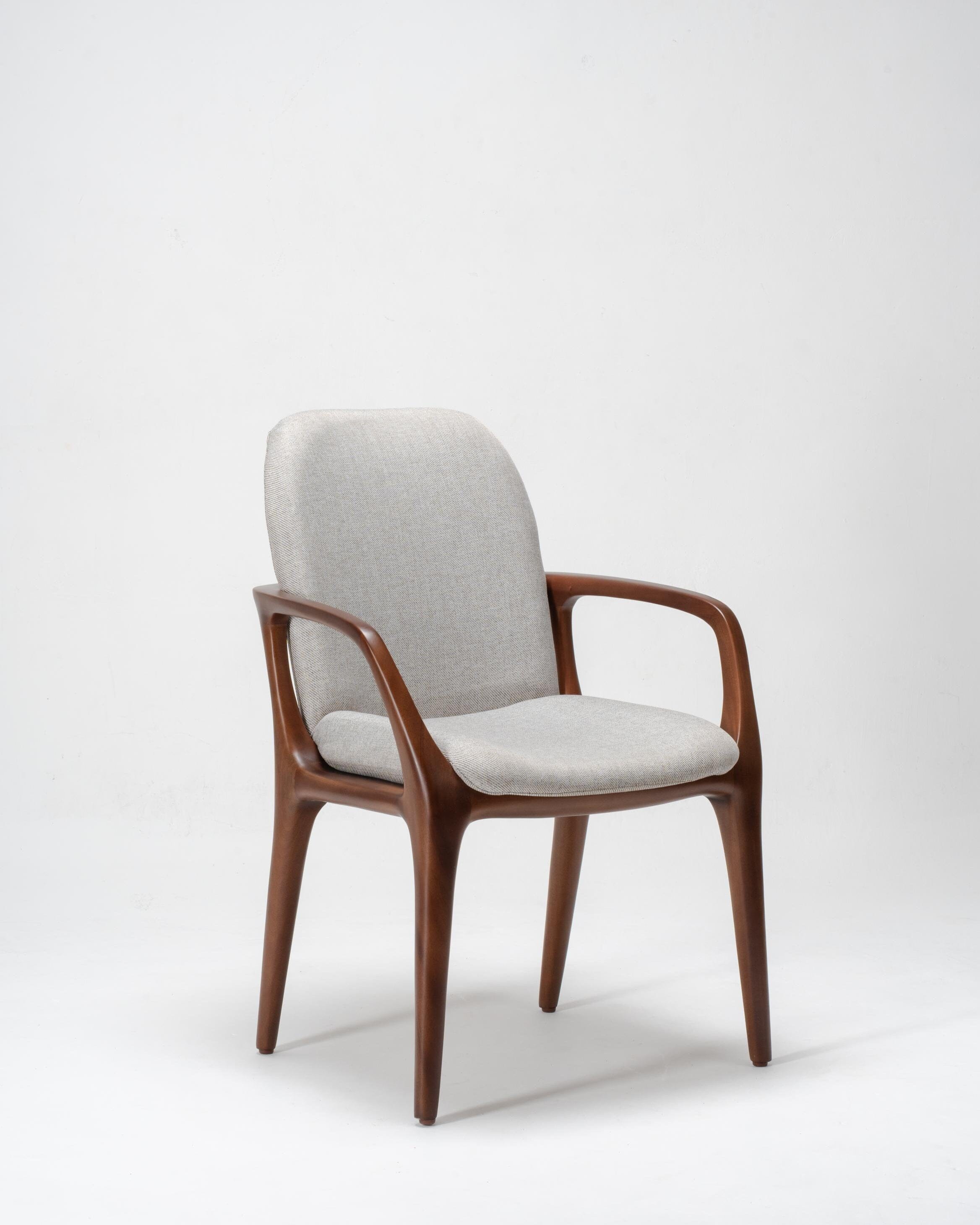 upholstered dining chair with mahogany wooden frame and grey fabric