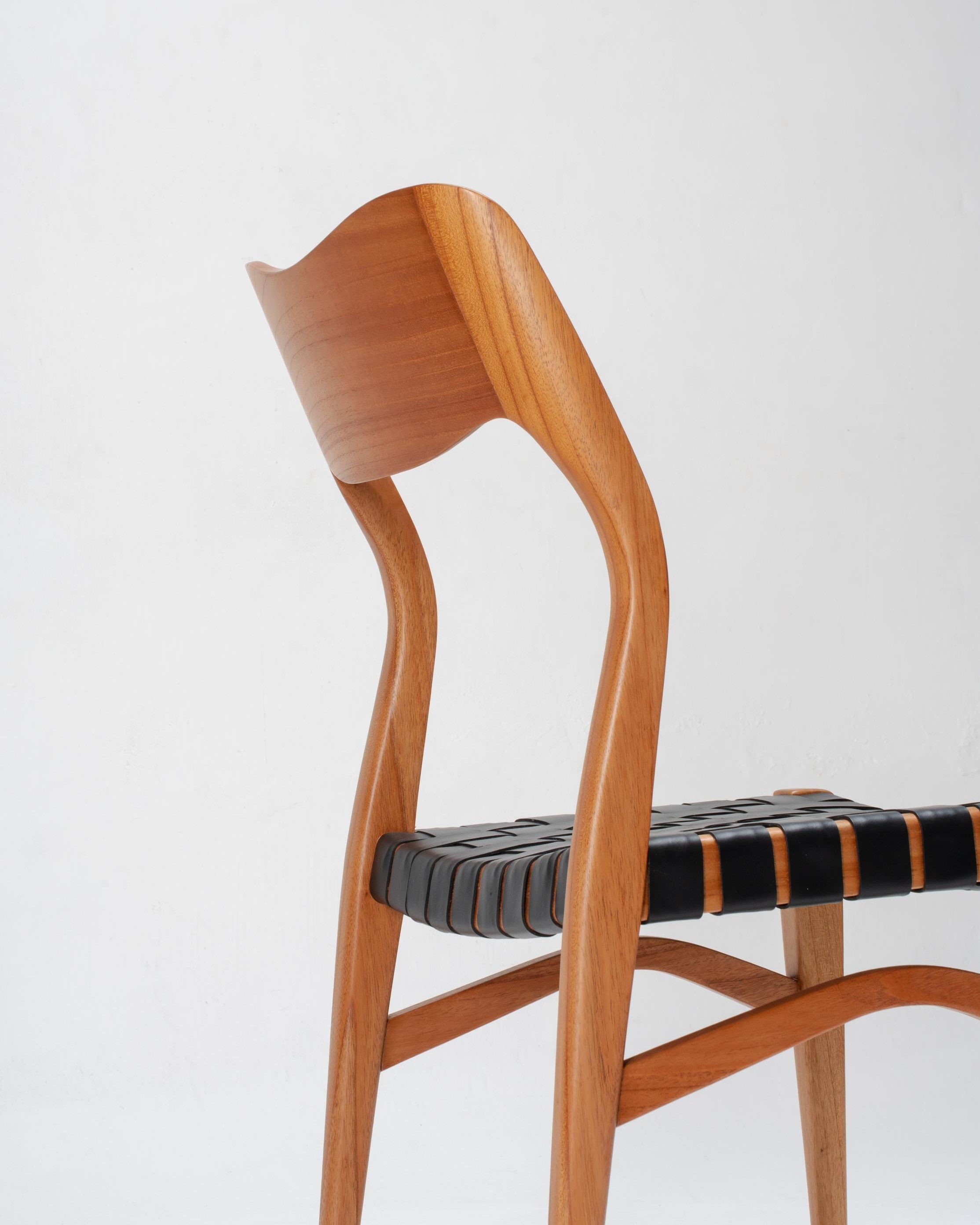 woven leather dining room chairs, made out of solid wood