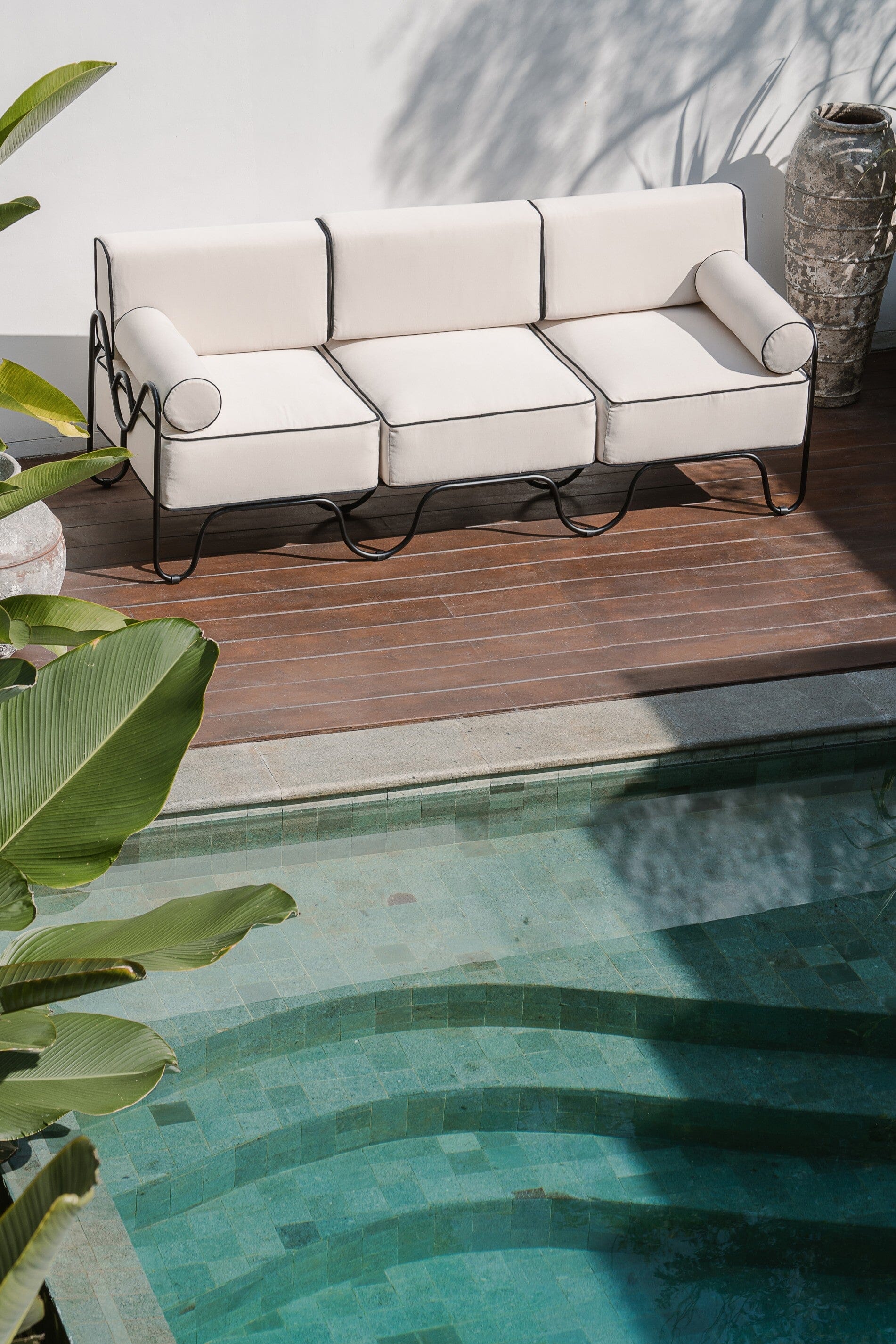 White cushion outdoor sofa, black metal, 2 seater