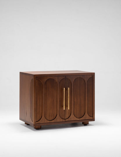 Wooden cabinet with large brass handles