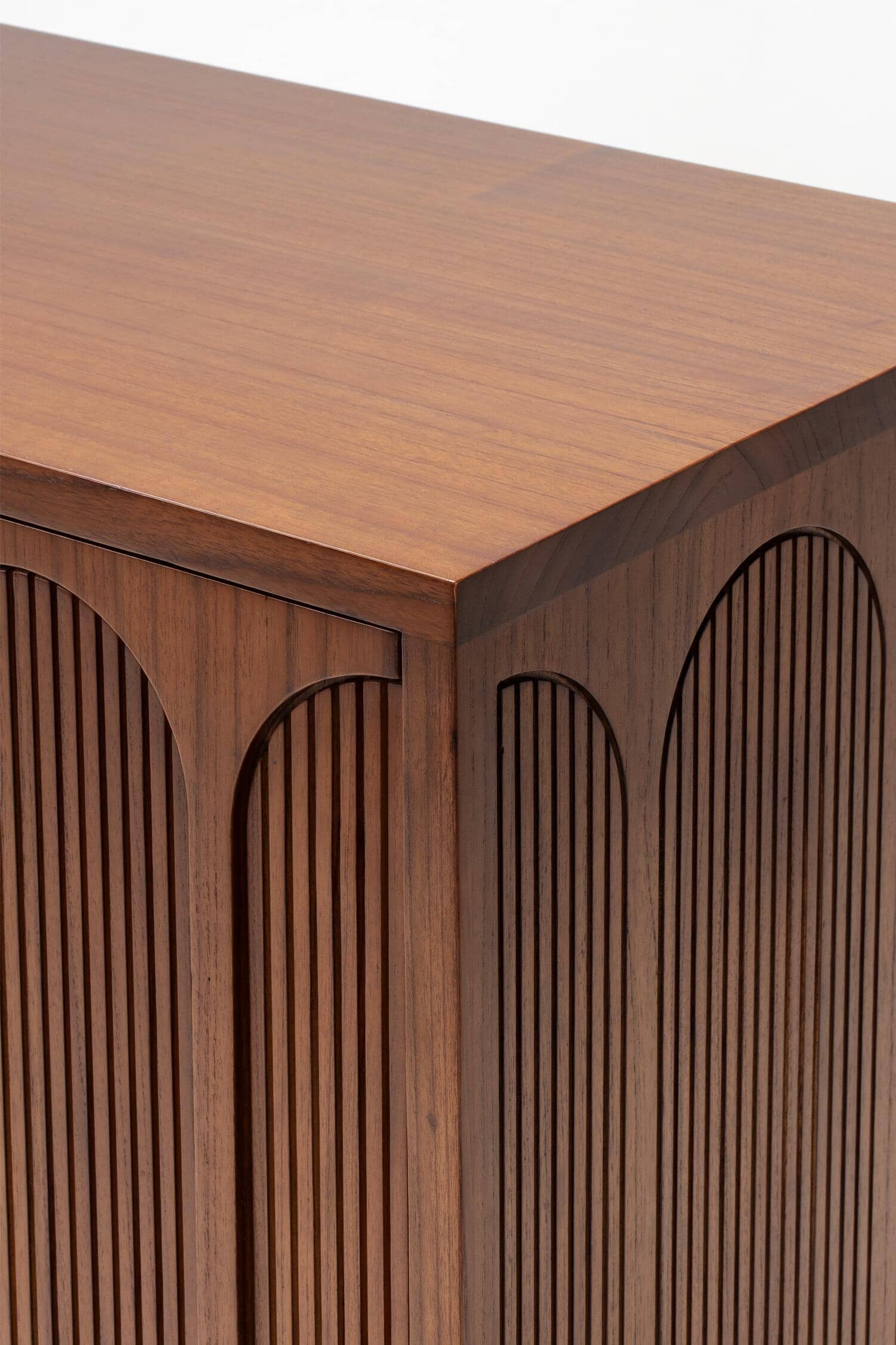 Close-up of a light wooden buffet cabinet