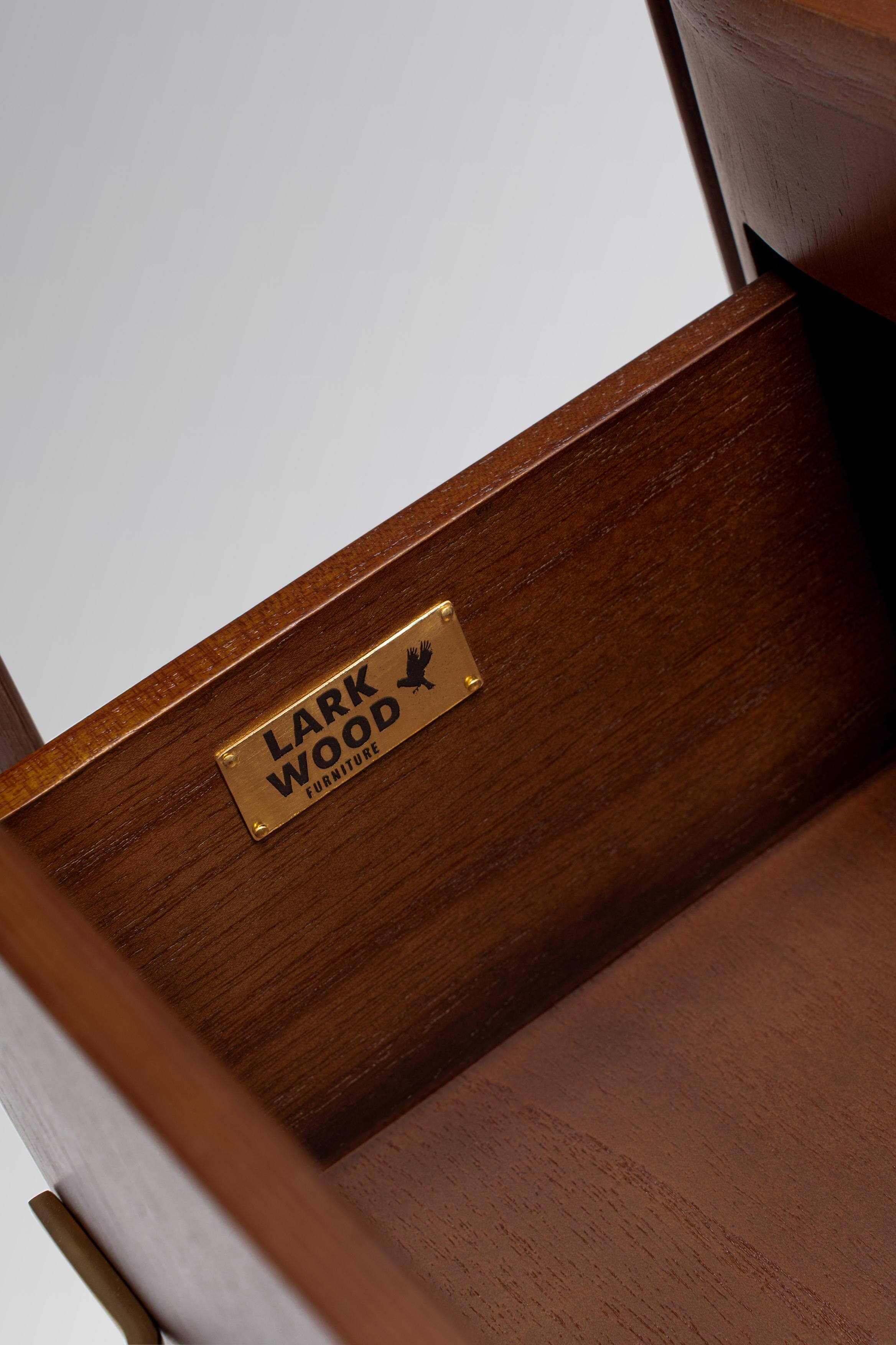 Wooden drawer with 'Larkwood' branding