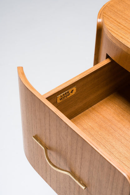 Wooden drawer with gold handle and 'Larkwood' branding 