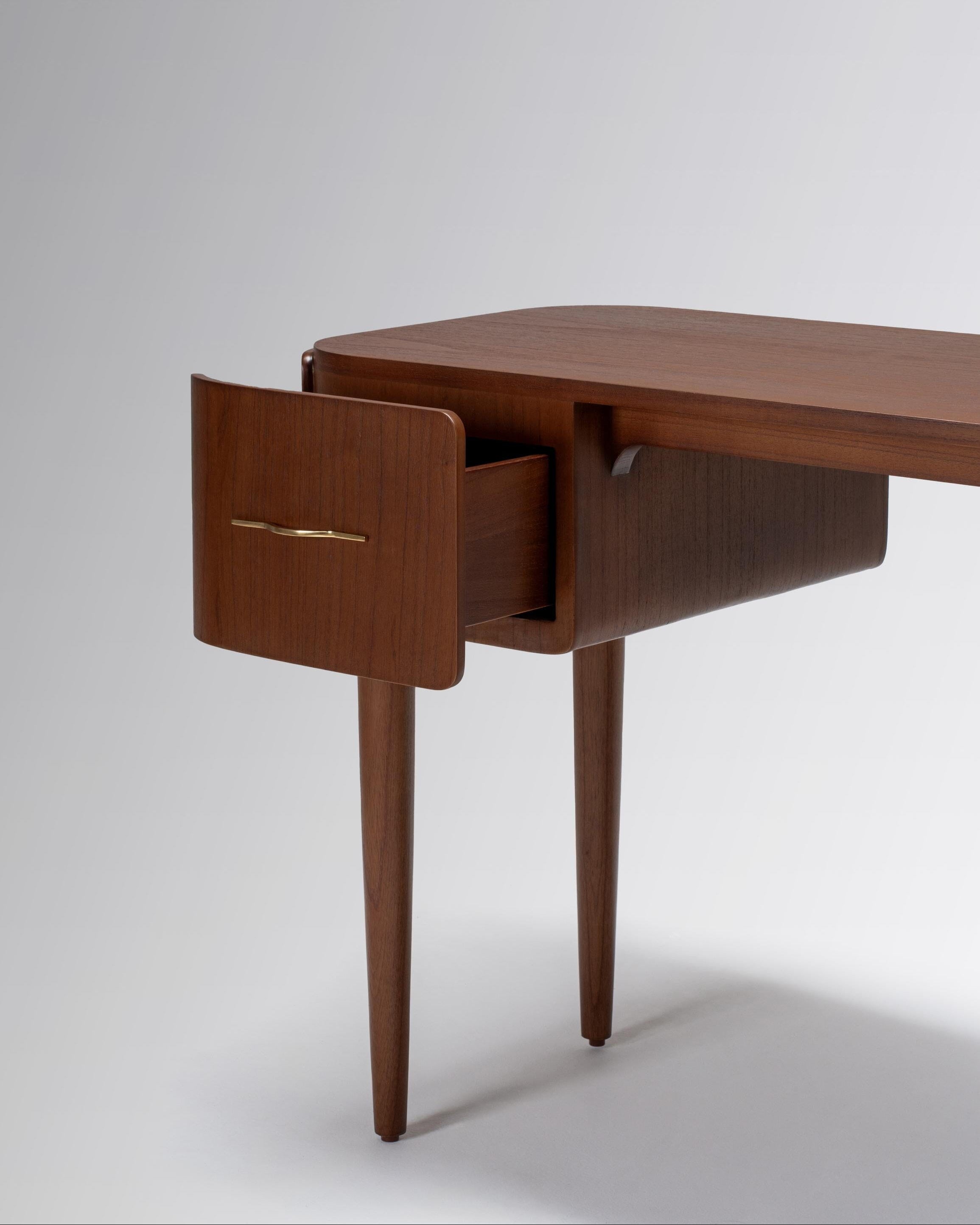 Wooden desk with a drawer open on a white background