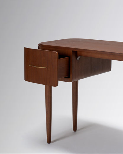 Wooden desk with a drawer open on a white background