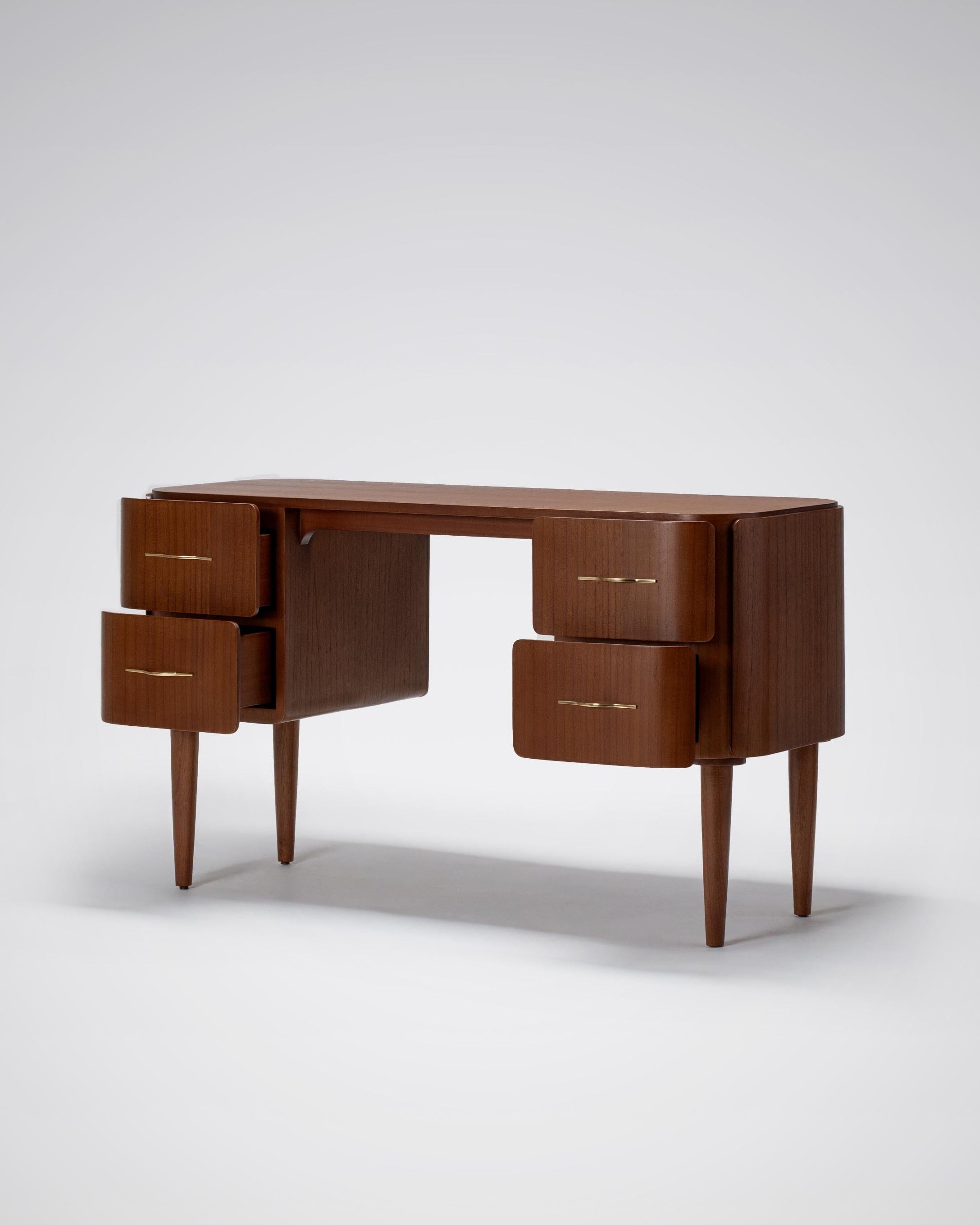 curvy wooden desk, dark finish and brass handle