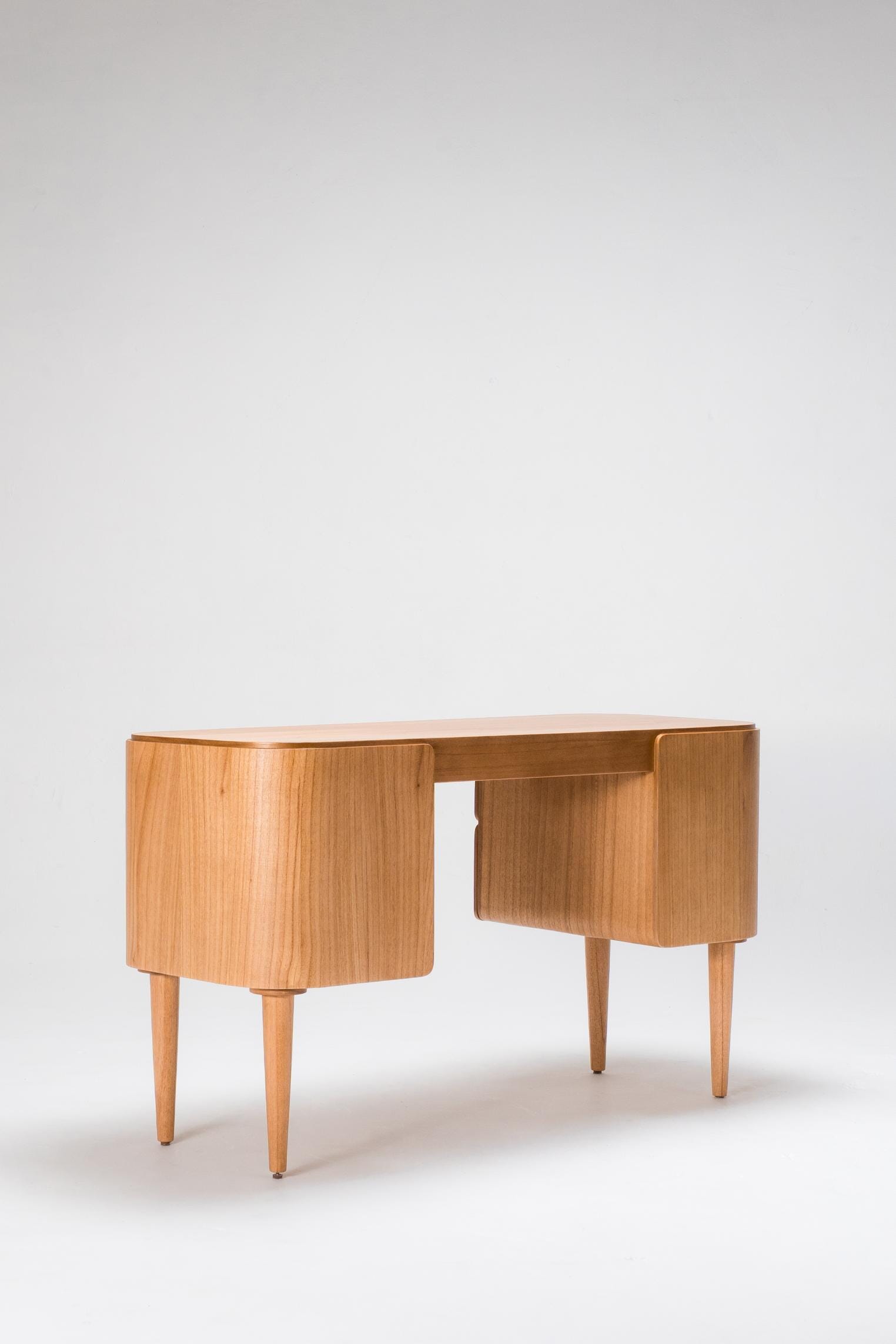 natural wood desk on a white background