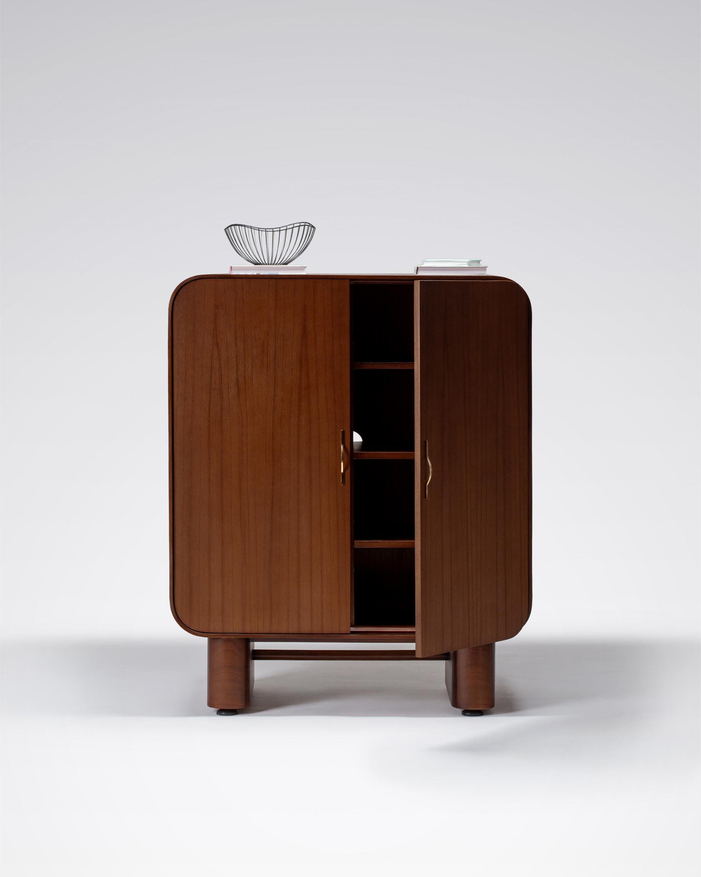 Wooden cabinet with open door on a white background