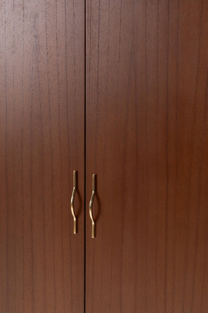 Wooden cabinet with brass handles