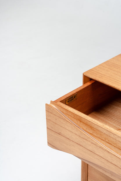 Wooden drawer open on a white background